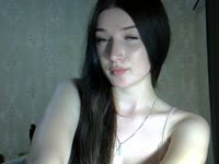 Hey, I’m LyraDream — not just a name, but a state of mind.My green eyes can be quiet… or very curious.I don’t undress — I unfold. Slowly. In words, in pauses, in a glance.
Once a girl with a football, now with a soft blanket, a cup of green tea, and a mood that knows how to tease in silence.I love morning light when everything is just beginning, and evening talks where there’s no “right,” only “real.”I sit in a cozy T-shirt, smiling with my eyes… and wondering — can you really watch when you’re not allowed to touch? Where would you take me first: Paris with a croissant, Tokyo with sake, or a private room where I look straight at you?Ask me a question, share a secret, play the quiet game — or just watch.